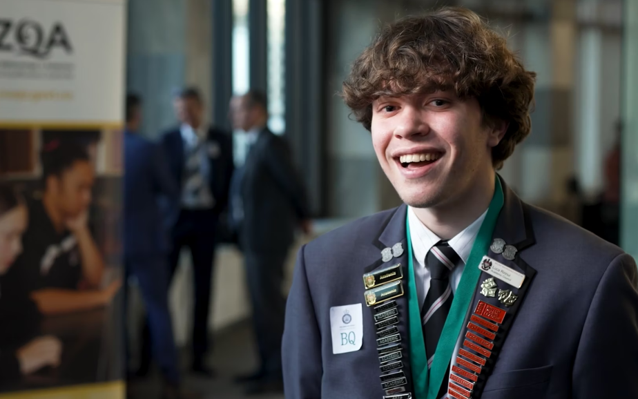 Luca looks at the camera and smiles