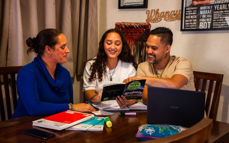 Parents and their tamāhine sit and learn about NCEA together