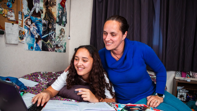 Mother and daughter study together