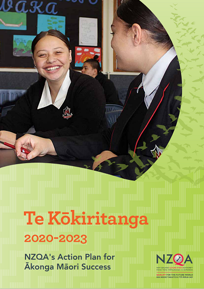 Cover of Te Kōkiritanga with two young Māori girls laughing sitting at a desk