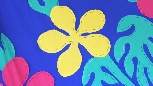 Tuvaevae quilt of frangipani flowers