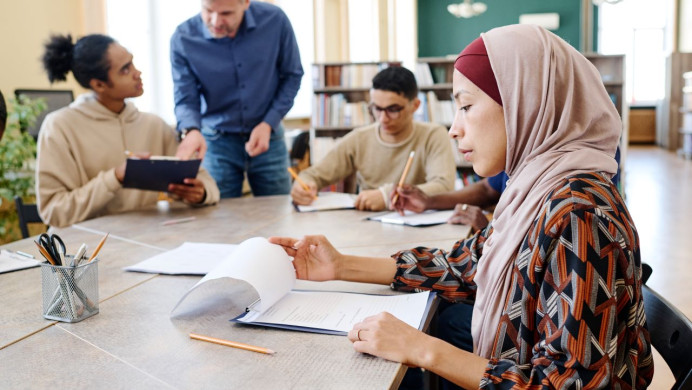 A group of English as a second language learners work towards an NZCEL qualification